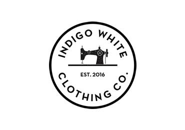 Indigo White Clothing referans logosu - tekstil üretim ve atölye geçiş alanları için PVC perde uygulaması